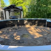 Drained pool interior prepared for seasonal service
